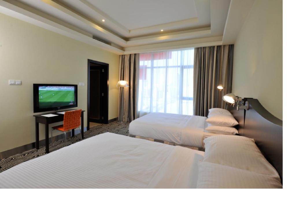 Al Raya Suites Hotel Manama Værelse billede